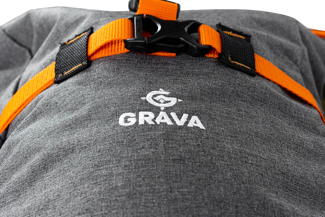 This view is a close up shot from the bottom of the backpack looking up.  This view highlights the quality of the logo stitching on our Grava Backpack.  The Grava logo is stitched in with great detail and the world Grava is also stitched in.