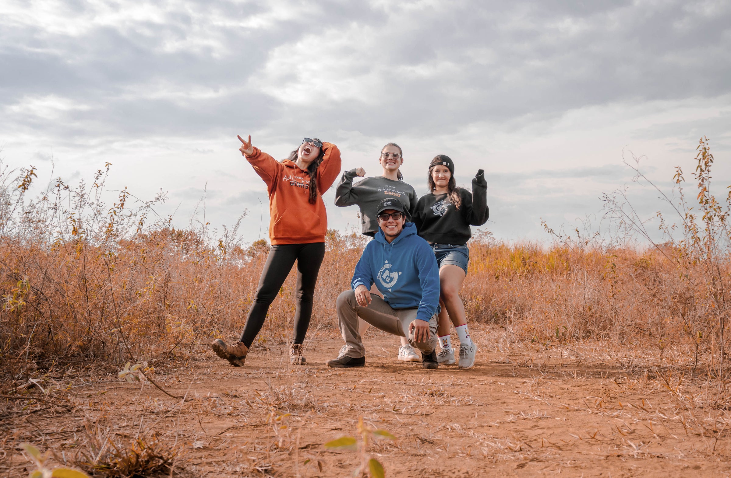 A group of people wearing their Go Grava hoodies