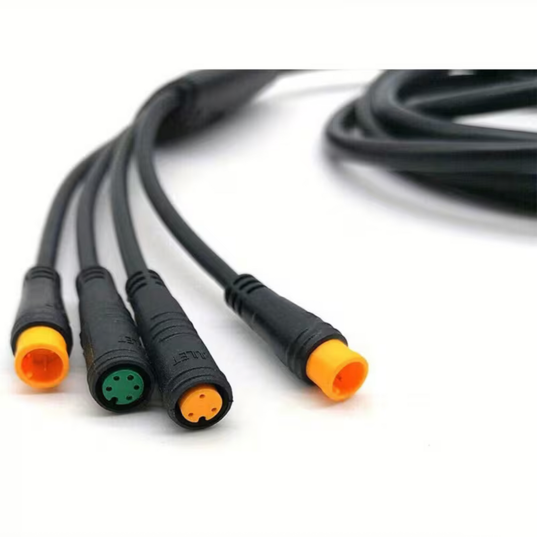 Black cables with colored connectors on a white background