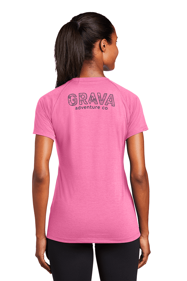 A pink Grava Women's Performance Shirt showcasing the iconic Etcha Sketch design. This high-performance shirt is designed for outdoor enthusiasts, offering a stylish and comfortable fit for women who love adventure.