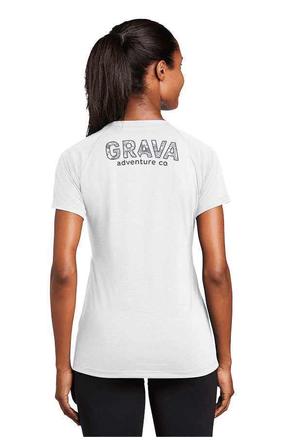 A white Grava Women's Performance Shirt featuring the iconic Etcha Sketch design. This high-performance shirt is designed for outdoor enthusiasts, offering a sleek and versatile option for women who seek adventure.