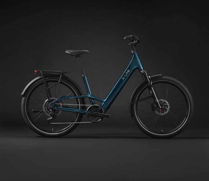X-LAB ST5+ LS Low Step electric bicycle in Deep Current Blue, drivetrain-side profile with rear rack and fenders