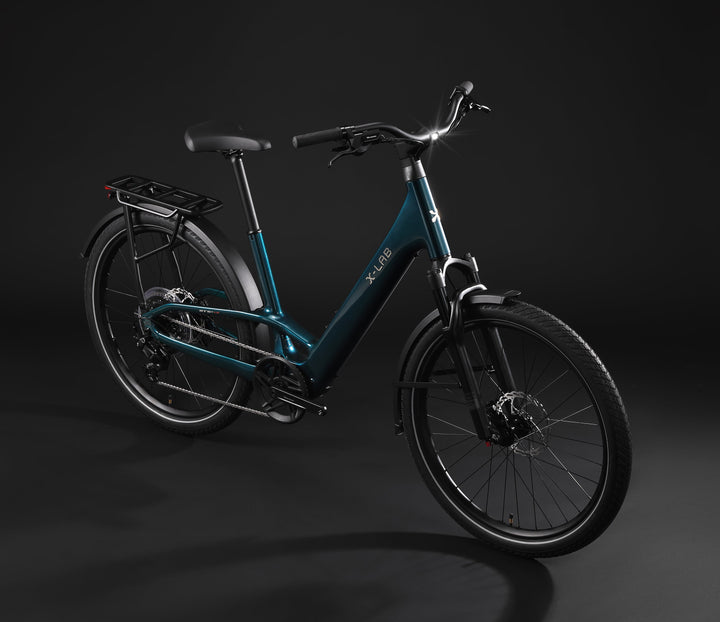 X-LAB ST5+ LS Low Step electric bicycle in Deep Current Blue, elevated front three-quarter view with integrated cockpit